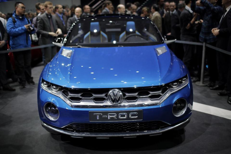 The new Volkswagen T-Roc, urban SUV concept car is introduced during a preview show of Volkswagen Group, as part of the 84th Geneva International Motor Show, Switzerland, Monday, March 3, 2014. The Motor Show will open its gates to the public from March 6 to 16. (AP Photo/Laurent Cipriani)