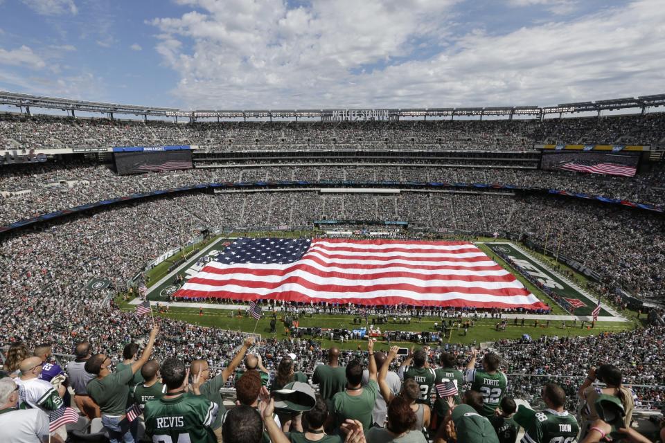 <p>Fans cheer during the playing of the national anthem before an NFL football game between the New York Jets and the Cincinnati Bengals Sunday, Sept. 11, 2016 in East Rutherford, N.J. (AP Photo/Frank Franklin II) </p>