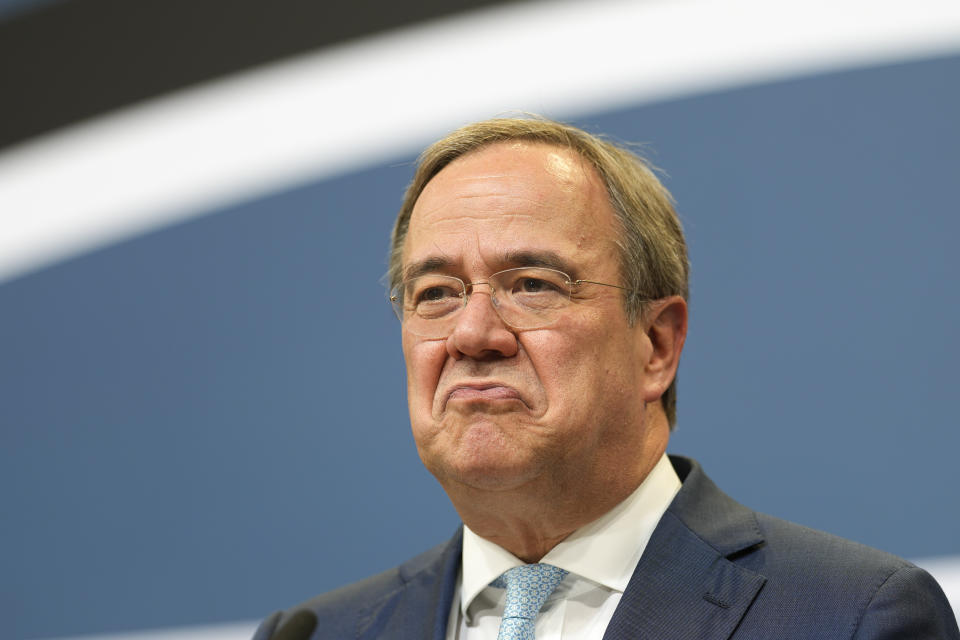 Christian Democratic Union party chairman Armin Laschet speaks to media at the party's headquarters in Berlin, Thursday, Oct. 7, 2021. (AP Photo/Markus Schreiber)