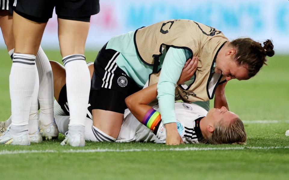 Germany's Alexandra Popp celebrates with teammates after the match - REUTERS