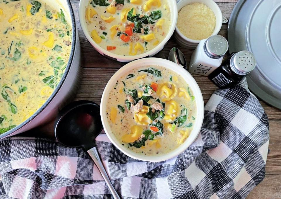 <p>Krista Marshall</p><p>Come inside to a hearty soup that tastes like it was cooked all day, but can be on the table in about 30 minutes.</p><p><strong>Get the recipe: <a href="https://parade.com/1381239/kristamarshall/creamy-sausage-tortellini-soup/" rel="nofollow noopener" target="_blank" data-ylk="slk:Creamy Sausage Tortellini Soup;elm:context_link;itc:0;sec:content-canvas" class="link ">Creamy Sausage Tortellini Soup</a></strong></p>