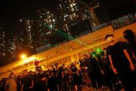 Protest at Yuen Long MTR station, the scene of an attack by suspected triad gang members a month ago