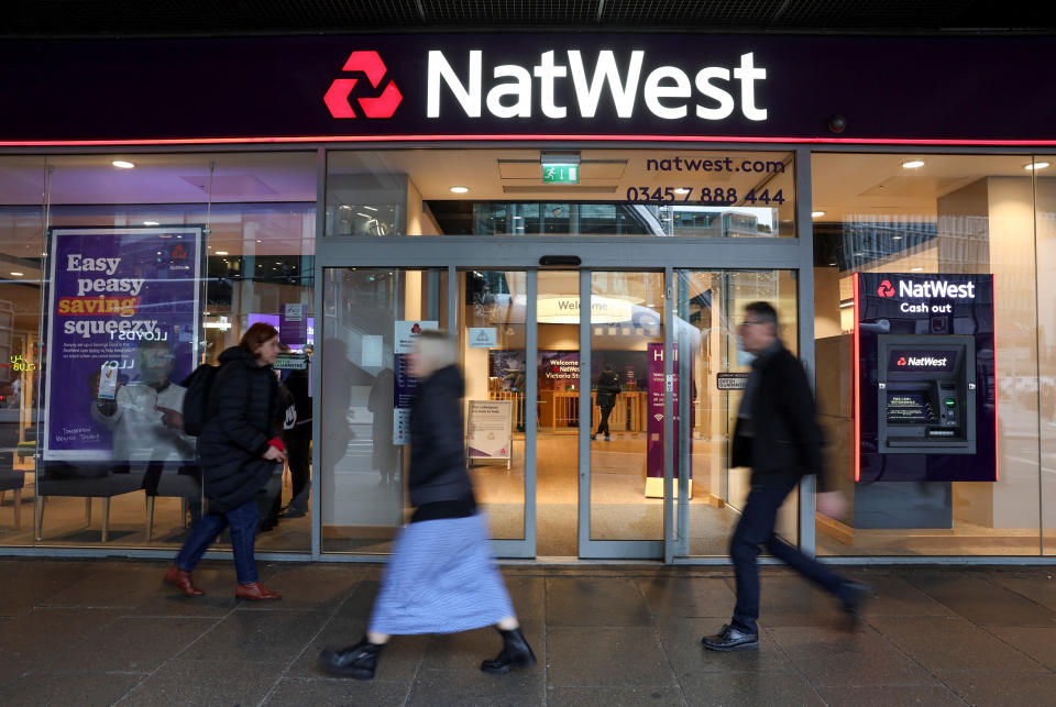 People walk past a Natwest Bank branch in central London, Britain November 22, 2023. REUTERS/Isabel Infantes/ File Photo