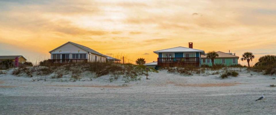 St. Augustine, Florida - March 8, 2019: Beautiful beach houses on St. Augustine Beach in Florida at sunset.
