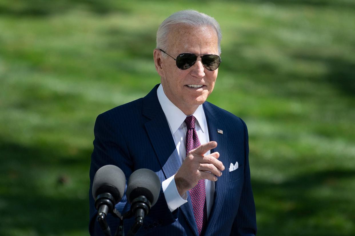 <p>US President Joe Biden speaks about updated CDC guidance on masks for people who are fully vaccinated during an event in front of the White House April 27, 2021, in Washington, DC. </p> (BRENDAN SMIALOWSKI/AFP via Getty Images)