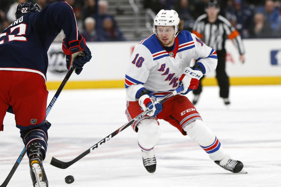 FILE - In this Feb. 14, 2020, file photo, New York Rangers' Artemi Panarin, of Russia, plays against the Columbus Blue Jackets during an NHL hockey game in Columbus, Ohio. The Edmonton Oilers’ sudden resurgence placed Connor McDavid back in the NHL MVP conversation, along with teammate Leon Draisaitl. Colorado’s Nathan MacKinnon and Boston’s David Pastrnak made their case, too, during a pandemic-shortened season. And don’t forget New York Rangers' Artemi Panarin, a late entry in the discussion. (AP Photo/Jay LaPrete, FIle)