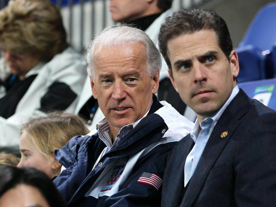 United States vice-president Joe Biden (L) and his son Hunter Biden (R) attend a women's ice hockey preliminary game between United States and China at UBC Thunderbird Arena on February 14, 2010 in Vancouver, Canada.