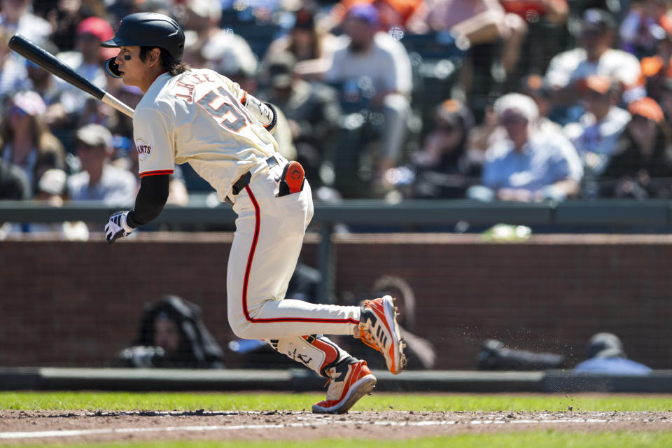 San Francisco Giants' Jung Hoo Lee runs after hitting a single during the sixth inning of a baseball game against the Arizona Diamondbacks, Saturday, April 20, 2024, in San Francisco. (AP Photo/Nic Coury)