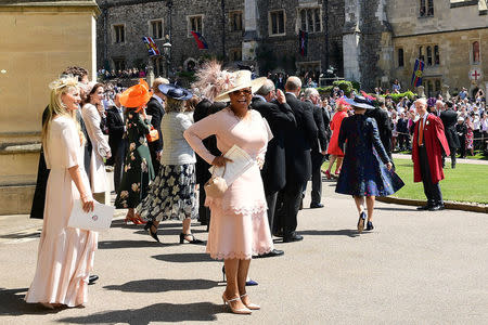 Oprah Winfrey leaves St George's Chapel at Windsor Castle after the wedding of Meghan Markle and Prince Harry in Windsor, Britain, May 19, 2018. Ian West/Pool via REUTERS