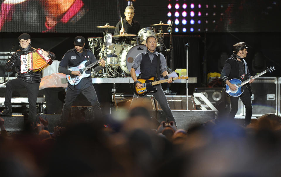 Bruce Springsteen and the E Street Band perform during the 2014 NCAA March Madness Music Festival - Capital One JamFest, Sunday, April 6, 2014 in Dallas. (Photo by Matt Strasen/Invision/AP)