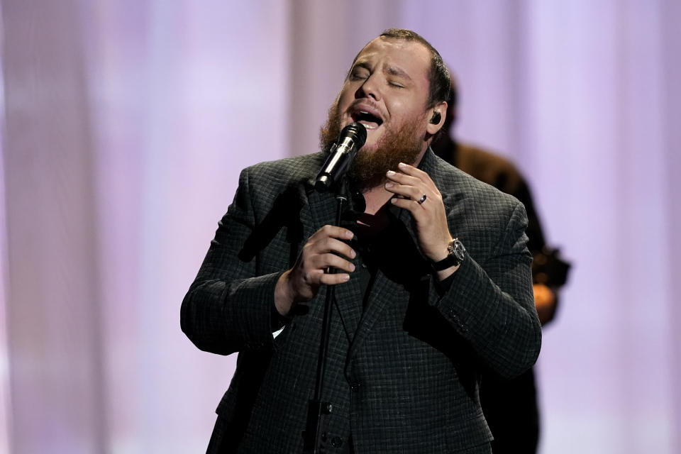 Luke Combs performs at the 56th annual Academy of Country Music Awards on Friday, April 16, 2021, at the Grand Ole Opry in Nashville, Tenn. The awards show airs on April 18 with both live and prerecorded segments. (AP Photo/Mark Humphrey)