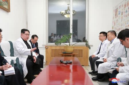 North Korean leader Kim Jong Un visits a hospital following a bus accident involving Chinese tourists in North Hwanghae province, in this undated photo released by North Korea's Korean Central News Agency (KCNA) in Pyongyang on April 24, 2018. KCNA/via Reuters