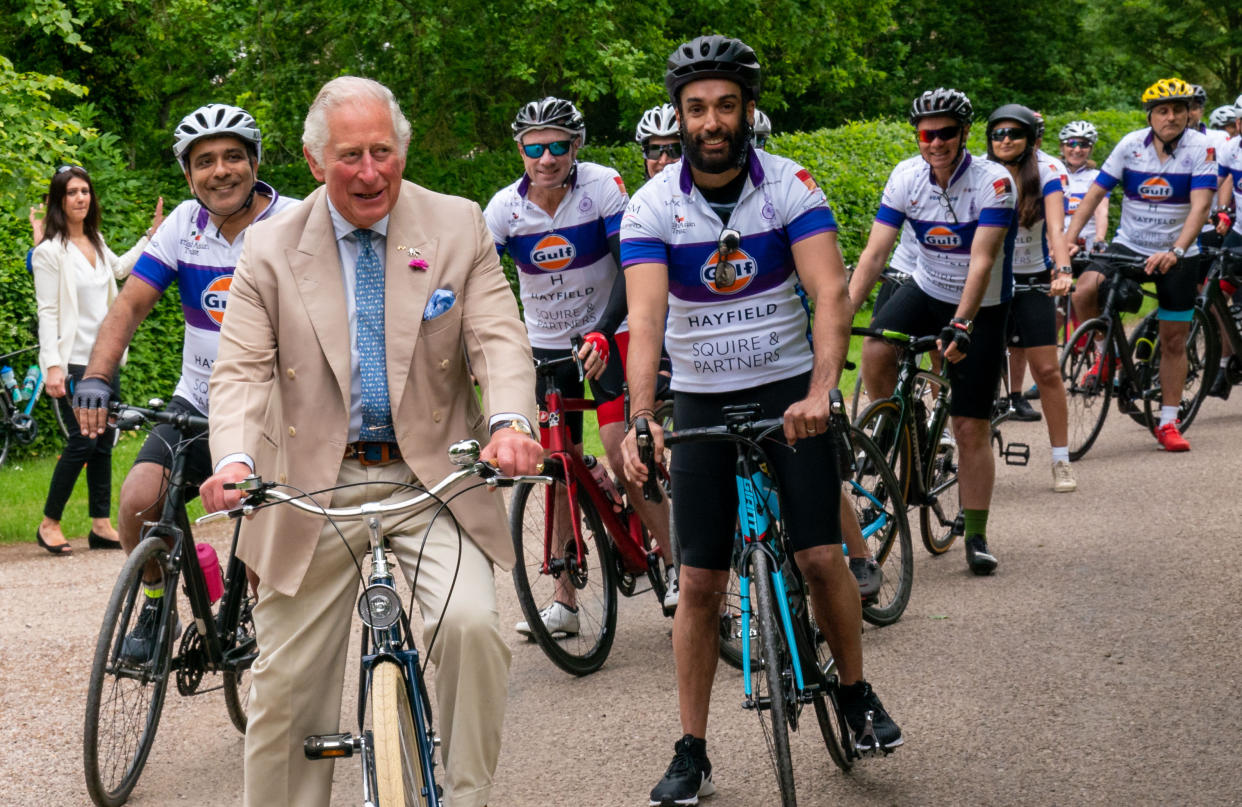 The Prince of Wales cycles with representatives of the British Asian Trust at Highgrove in Gloucestershire before they embark on the charity's 'Palaces on Wheels' cycling event. Picture date: Thursday June 10, 2021.