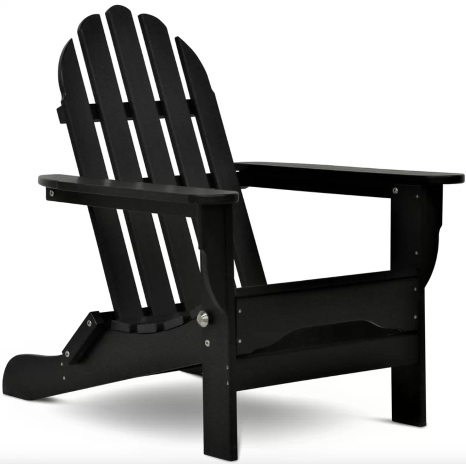 Hartington Plastic Folding Adirondack Chair in black (Photo via Wayfair)