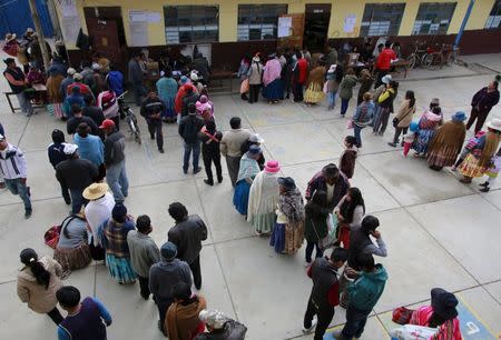 People take part in a national referendum in El Alto, Bolivia February 21, 2016. REUTERS/David Mercado
