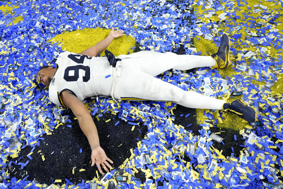 Michigan defensive lineman Kris Jenkins (94) celebrates after the Big Ten championship NCAA college football game against Iowa, Saturday, Dec. 2, 2023, in Indianapolis. Michigan won 26-0. (AP Photo/AJ Mast)