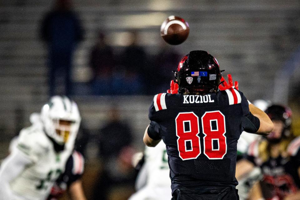 Ball State tight end Tanner Koziol catches a pass during a Mid-American Conference game against Ohio at Scheumann Stadium Tuesday, Nov. 15, 2022.