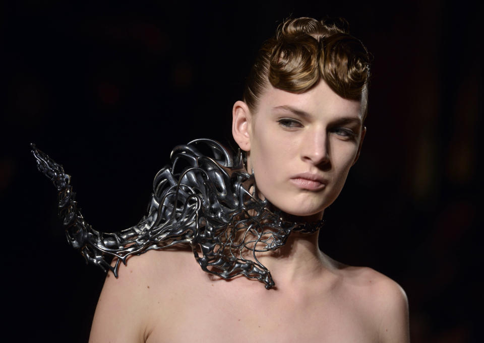 A model wears a creation by Dutch fashion designer Iris van Herpen for her Spring Summer 2013 Haute Couture fashion collection, presented in Paris, Monday, Jan.21, 2013. (AP Photo/Benjamin Girette)