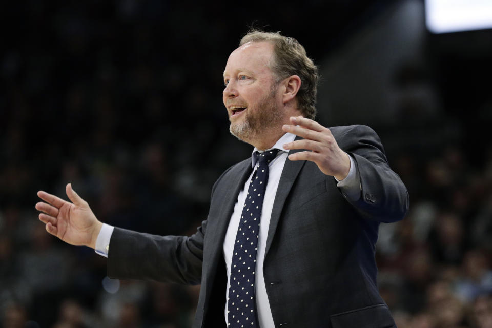 FILE - In this Jan. 6, 2020, file photo, Milwaukee Bucks head coach Mike Budenholzer reacts to a call during the first half of an NBA basketball game against the San Antonio Spurs in San Antonio. The NBA-leading Bucks remain confident the pandemic won’t put a permanent halt to the season and that they’ll get to resume chasing their first league title in nearly half a century. The Bucks owned a 53-12 record when play was suspended on March 11. (AP Photo/Eric Gay, File)