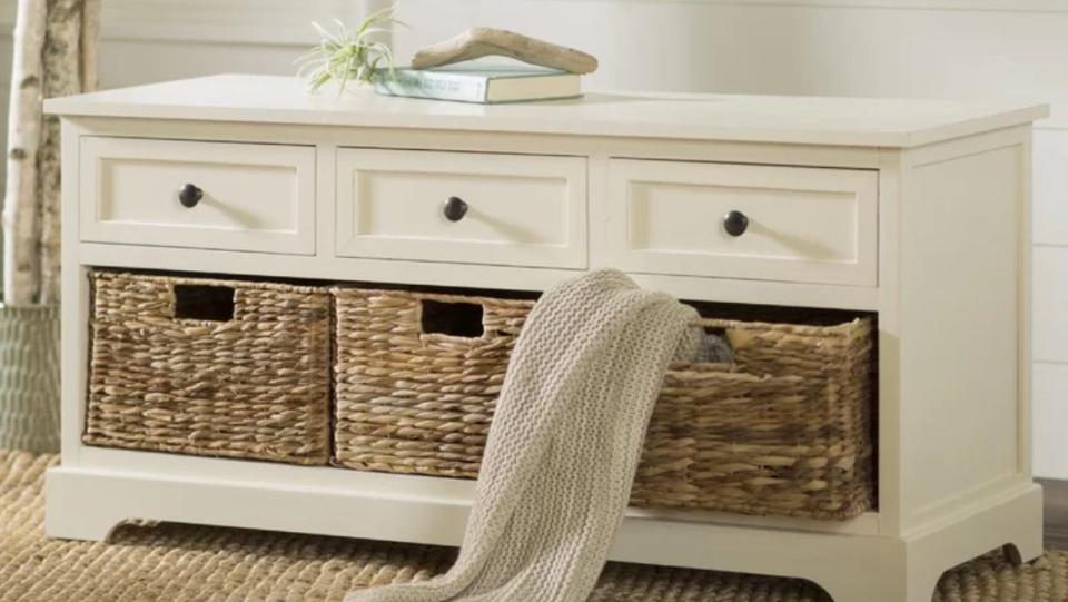 The Beachcrest Home Ardina Wood Storage Bench is ideal for entryways.