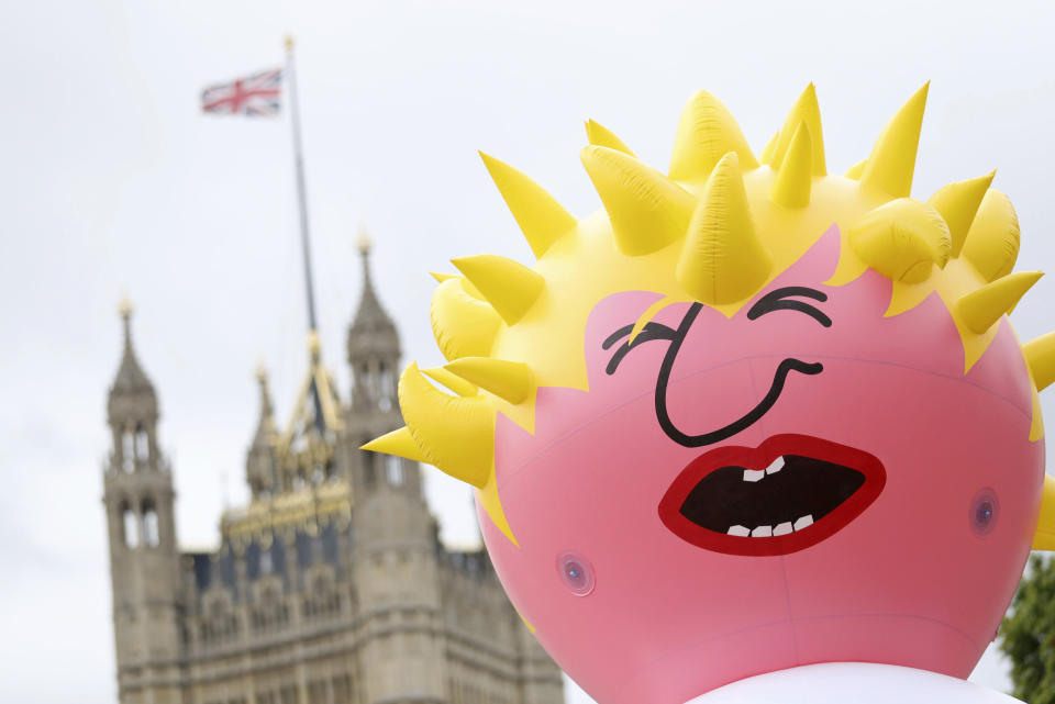 A view of a blimp depicting Boris Johnson that will be launched in Parliament Square, ahead of a pro-European Union march organised by March for Change, in London, Saturday July 20, 2019. (Aaron Chown/PA via AP)