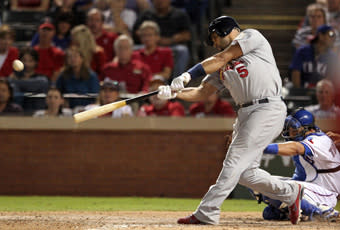 Albert Pujols connects on his third home run in Game 3 of the World Series, a solo shot off Rangers reliever Darren Oliver