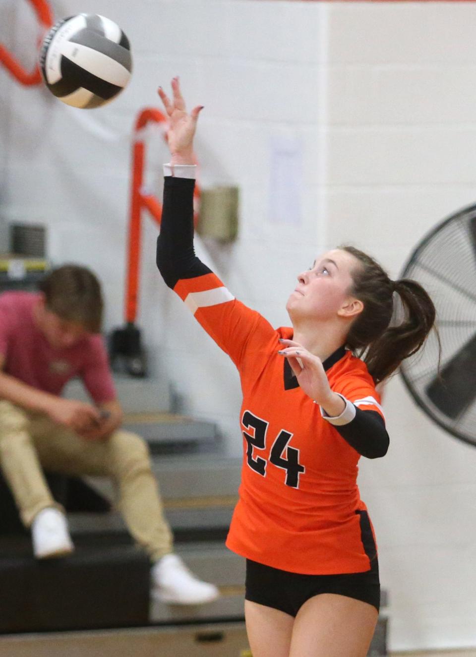 Janelle Swisher, serving at Hoover a year ago, served 10 straight points Wednesday for Marlington, in addition to breaking the school's single-season record for assists.