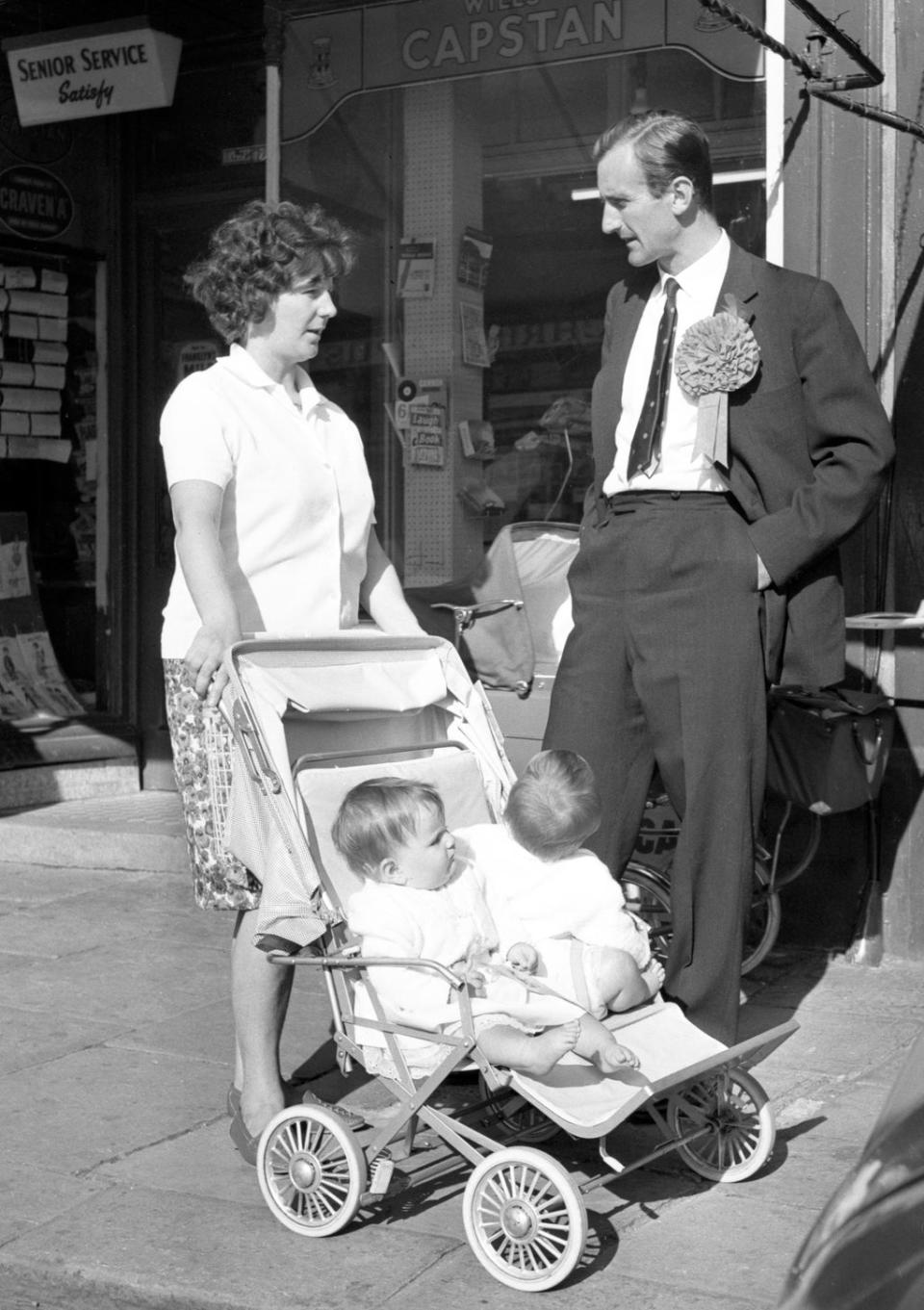 Ted Dexter, out canvassing in the south-east Cardiff constituency, was a Conservative Party candidate in the 1964 General Election (PA). (PA Archive)