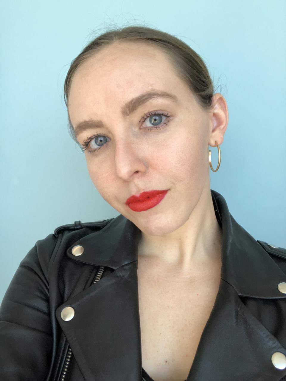 Allure editor Sarah Kinonen wears the Origins Blooming Lipstick in Tiger Lily