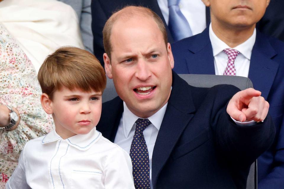 <p>Max Mumby/Indigo/Getty </p> Prince Louis and Prince William at the Platinum Jubilee Pageant on June 5, 2022