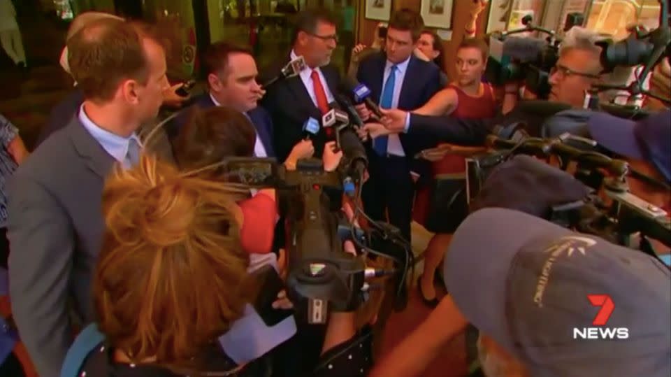 Ben McCormack and his lawyer face the media scrum outside court on Friday. Source: 7 News