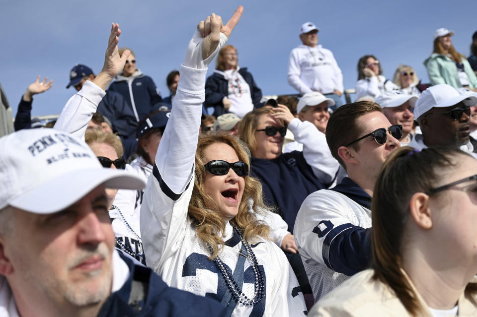 Pennsylvania State University supporters cheer at the 134th Rose Parade in Pasadena, Calif., Monday, Jan. 2, 2023. (AP Photo/Michael Owen Baker)