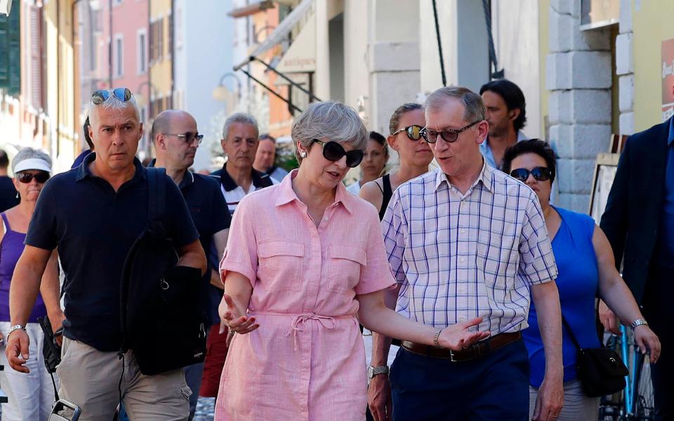 May is spending her holidays in northern Italy - Credit: ANTONIO CALANNI/AFP/Getty Images