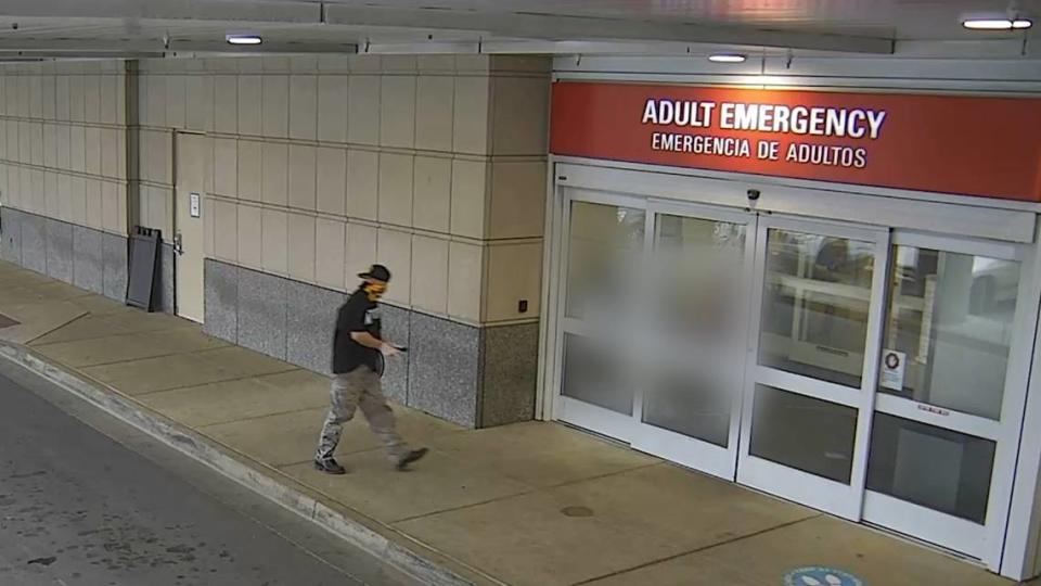 Still from video provided by the University of Kentucky that shows Bryan Carroll, a man arrested on multiple state and federal weapons charges, going into UK Chandler Hospital’s emergency department.