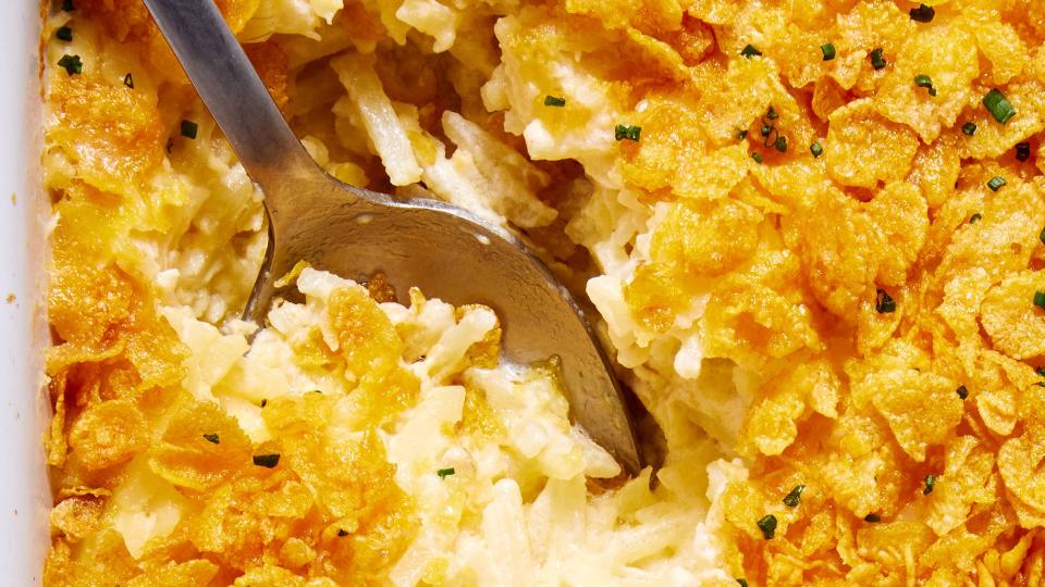 creamy cheesy potatoes with a buttery cornflake topping