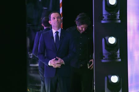 French Socialist party politician and former education minister Benoit Hamon waits before the final debate in the French left's presidential primary election with former prime minister Manuel Valls (not pictured) in La Plaine-Saint-Denis, near Paris, France, January 25, 2017. REUTERS/Bertrand Guay/Pool