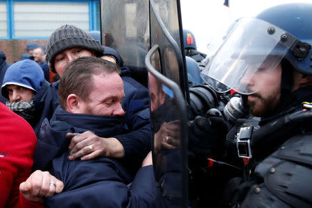 Prison wardens face off with French gendarmes as they block the Maubeuge jail during a nationwide protest, France, January 24, 2018. REUTERS/Pascal Rossignol