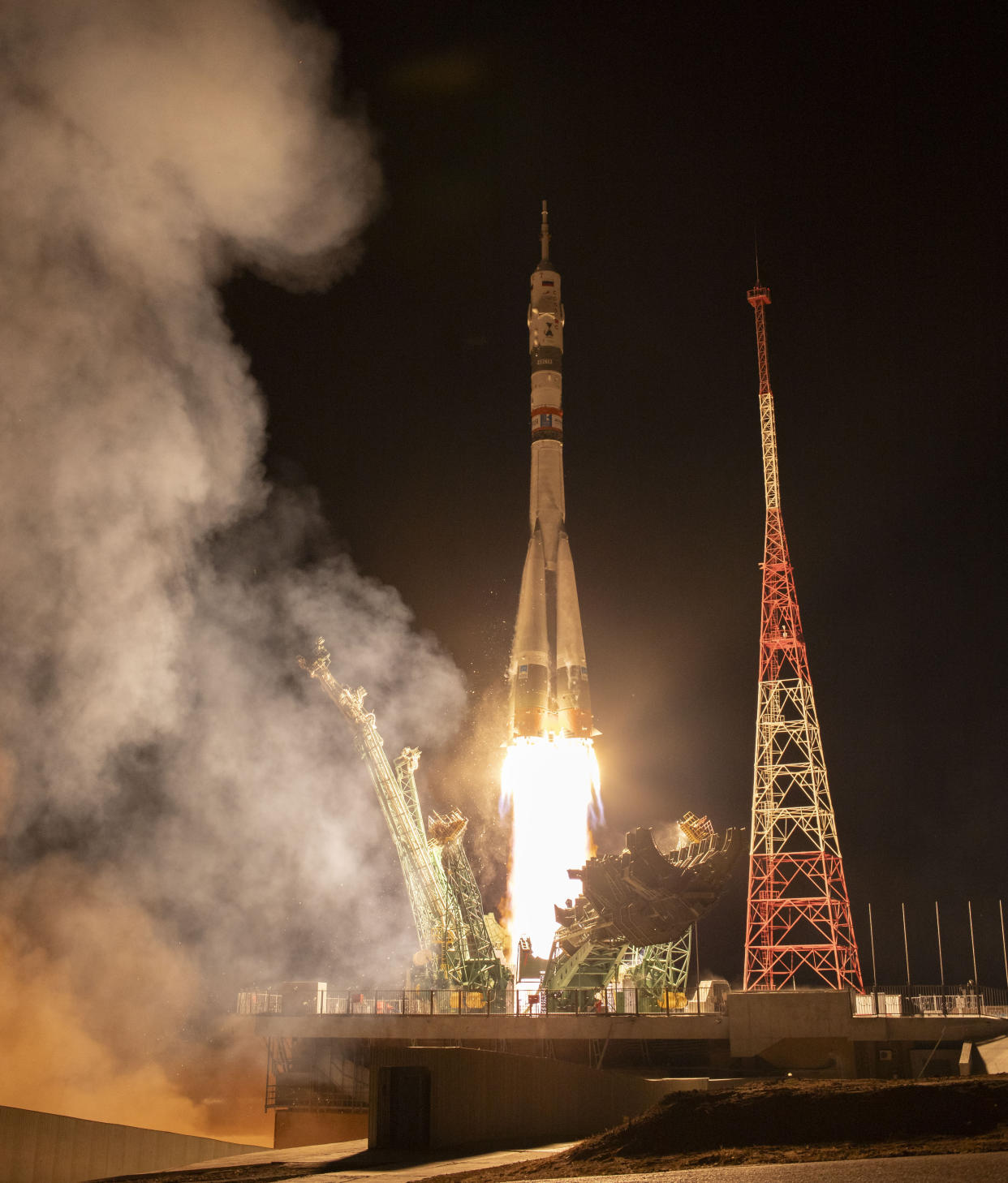 In this image provided by NASA, a Soyuz rocket carrying Roscosmos cosmonauts Alexey Ovchinin, Ivan Vagner and NASA astronaut Don Pettit, a new crew to the International Space Station (ISS), blasts off from the Russian leased Baikonur cosmodrome in Kazakhstan, Wednesday, Sept. 11, 2024. (Bill Ingalls/NASA via AP)