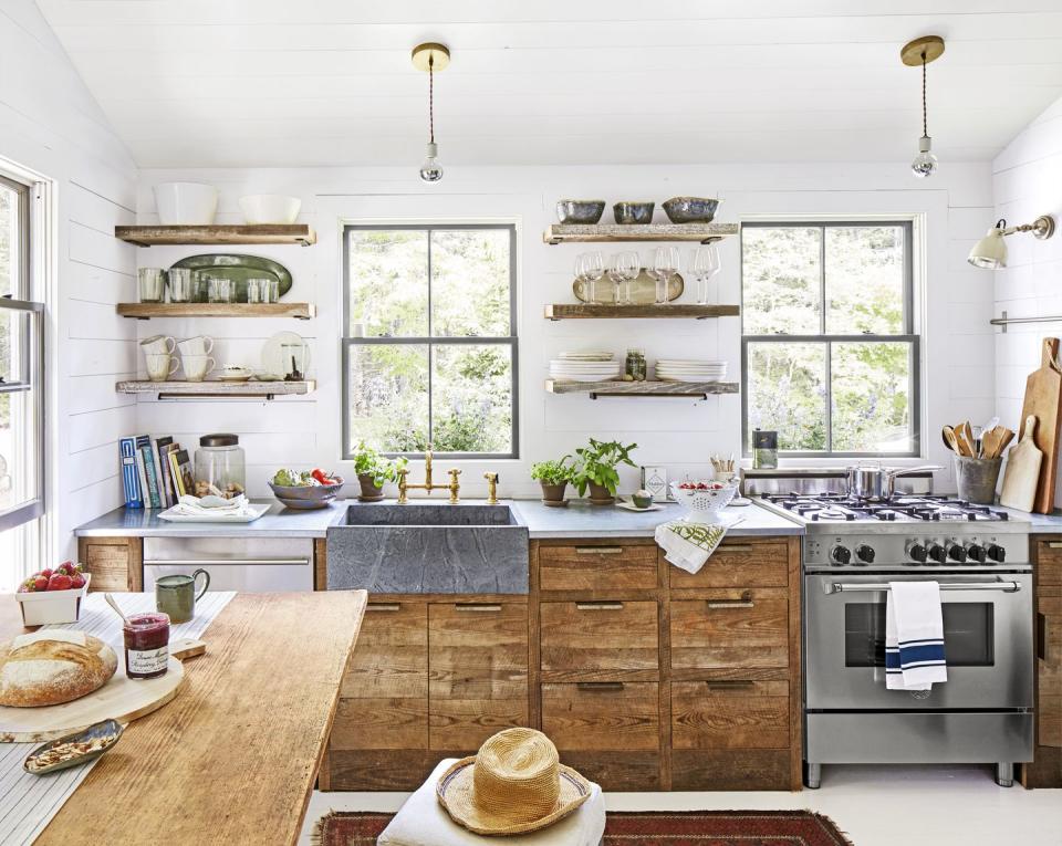 cottage kitchen with rustic wood drawers and shelves