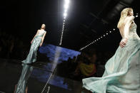 Models wear creations part of the Alberta Ferretti women's Spring-Summer 2013 collection that was presented in Milan, Italy, Wednesday, Sept. 19, 2012. (AP Photo/Luca Bruno)