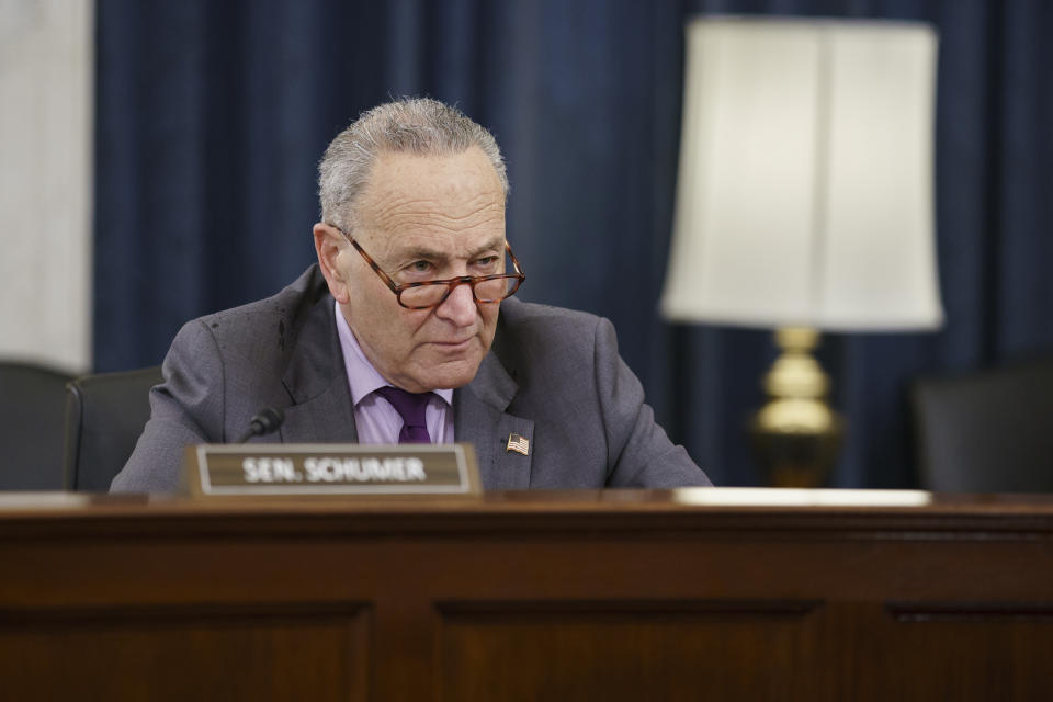 Senate Majority Leader Chuck Schumer, D-N.Y., listens as the Senate Rules Committee holds a hearing on the "For the People Act," which would expand access to voting and other voting reforms, at the Capitol in Washington, Wednesday, March 24, 2021. The bill has already passed in the House. (AP Photo/J. Scott Applewhite)