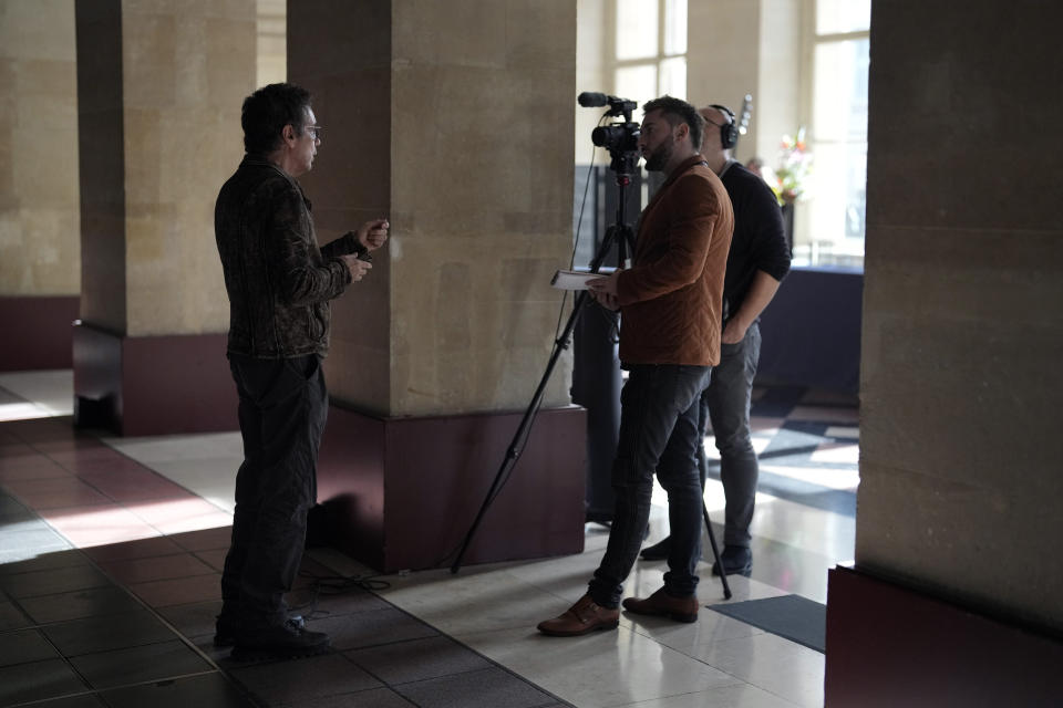 French electronic music performer Jean-Michel Jarre is interviewed by Associated Press, in Paris, Tuesday, Oct. 25, 2022. Genes — and a dash of humility — are the secrets of longevity for one of France's biggest music stars, Jean-Michel Jarre, the septuagenarian electronic music pioneer who's sold over 85 million records and is still going strong. (AP Photo/Thibault Camus)