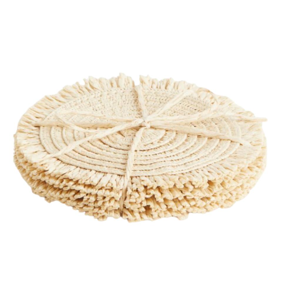 Four straw circular coasters in beige