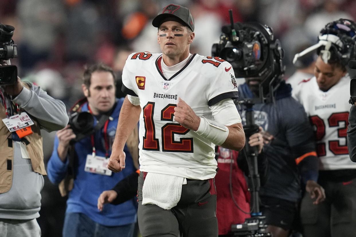 Tampa Bay Buccaneers quarterback Tom Brady (12) leaves the field after an NFL wild-card football game