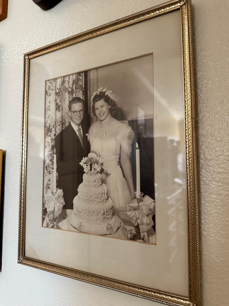 A young Dr. Marvin Lee Lykins and wife Frances Lykins can be seen in a photograph from their wedding day on display at his Oakmont of Brookside apartment on Jan. 25, 2024.