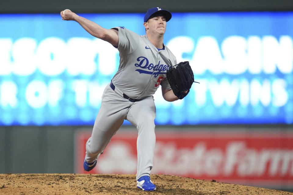 Los Angeles Dodgers pitcher Evan Phillips delivers during the ninth inning of a baseball game against the Minnesota Twins, Monday, April 8, 2024, in Minneapolis. (AP Photo/Abbie Parr)