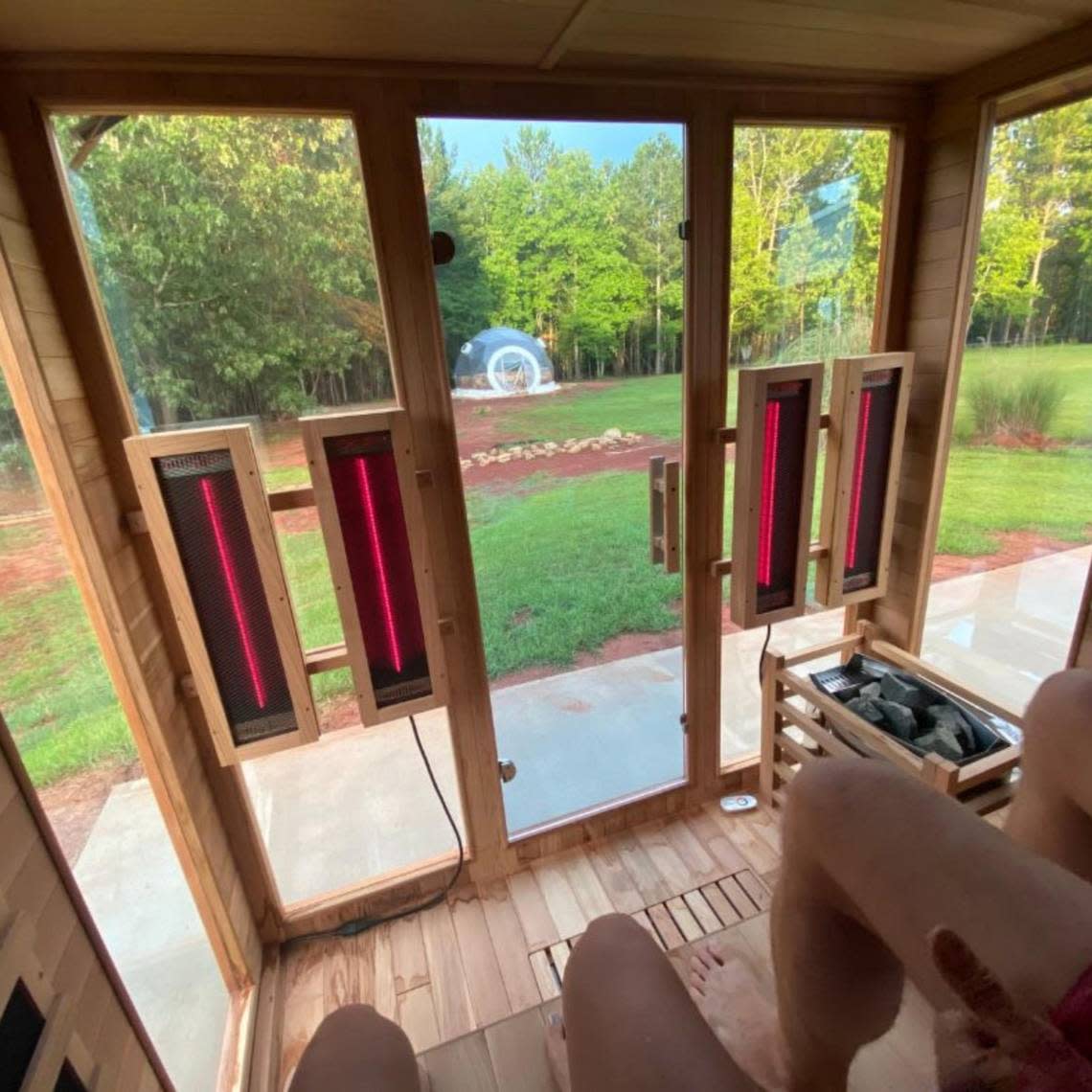 Guests enjoy a view of the peaceful outdoors while relaxing in an infra-red sauna at The Florrest in Hillsboro, GA. Courtesy The Florrest