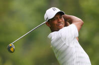 Tiger Woods hits his tee shot on the fourth hole during the first round of the Greenbrier Classic at the Old White TPC on July 5, 2012 in White Sulphur Springs, West Virginia. (Photo by Hunter Martin/Getty Images)