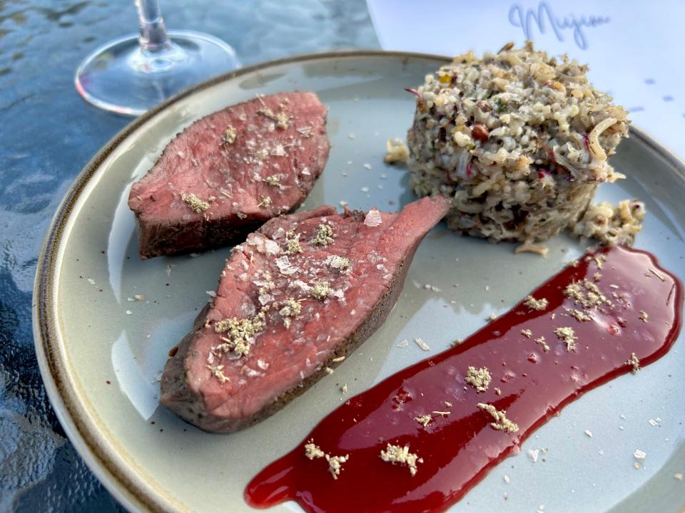 Venison striploin, one of the Miijim's meat dishes, is accented by a red plum sauce and manoomin (wild rice).