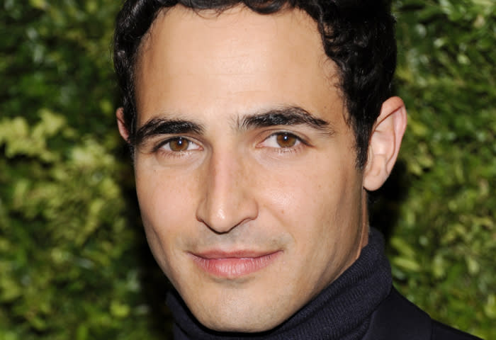 FILE - In this Nov. 14, 2011 file photo, designer Zac Posen attends the CFDA / Vogue Fashion Fund Awards in New York. Posen is the new featured judge for the new season of “Project Runway,” filling the chair that Michael Kors had sat in for the show’s first 10 seasons. The new season starts Jan. 24, 2013. (AP Photo/Evan Agostini, File)